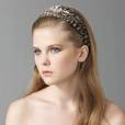 Jennifer Behr Wide Feather Headband, $158 at Saks - 0412904523941_cnatural_275x2751