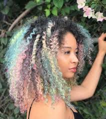 Pastel highlights on curly hair