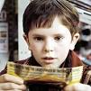 British actor Freddie Highmore plays Charlie Bucket, a worthy boy from a ... - inside-kids-highmore