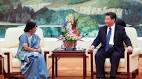 APEC doors open for India, President Xi, Sushma Swaraj discuss.