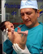 Doctor Luis Rubio carries Milagros Cerron - archive photo from May 2004 - _40793221_milagros203ap