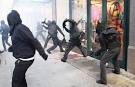 SEATTLE MAY DAY PROTEST MARKED BY VANDALISM, ARRESTS - latimes.
