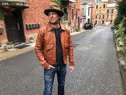 Brown leather jacket with hat