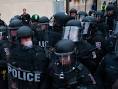 Baltimore police, protesters clash; college closed