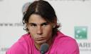 Rafael Nadal looks suitably glum after his defeat b y Robin Soderling.