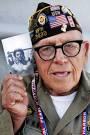 World War II Navy veteran Richard Osborn holds up an old photograph of ... - 70+Years+Since+Japan+Launched+Attack+Pearl+S5cSgcY0cXXl