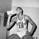 View full sizeWilt Chamberlain of the Philadelphia Warriors takes a drink of