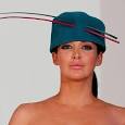 Sophia Cahill wore just a Robyn Coles hat during a fashion parade in London - Strange_But_True_5-_660249t