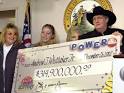 Powerball LOTTERY WINNER Andrew "Jack" Whittaker (R) holds a copy ...