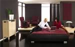 Awesome Black Beds With Red Quilts Also Two Red Single Sofas Also ...