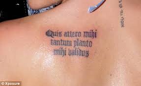 Latin Writing Tattoo