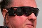 Attorney Dean Lloyd wears black sunglasses containing a tiny camera and ... - attorney_dean_lloyd_wears_black_sunglasses_contain_2474130954