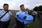 Bodies from crashed AirAsia plane arrive in Indonesian city | Reuters