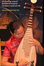 Liu Fang plays the pipa,