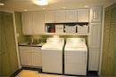 Bathroom: Laundry Room Shelving With Ironing Board And Basket ...