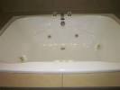 Yummy two person whirlpool bathtub (but note the faucet is ...