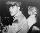 In this 1958 photo, Pvt. Elvis Presley, accompanied by girlfriend Anita Wood ... - 628x471