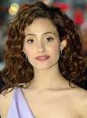 Emmy Rossum's glam curls are perfect for dressy events. - emmy-rossum-curly-brunette