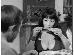 Tura Satana eats suggestively