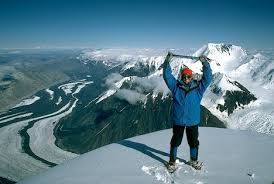 Female Mountaineer On Summit