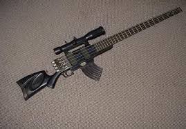 http://t0.gstatic.com/images?q=tbn:a8bkWoTGa0phEM:http://i752.photobucket.com/albums/xx165/oh_sleeper_111/guitar-gun.jpg&t=1