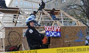 Occupy DC protesters sit atop