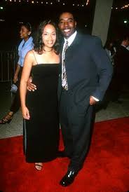 Morris Chestnut and wife at