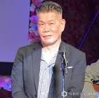 梅垣義明