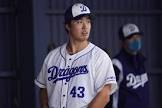 三ツ間卓也