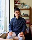 名越康文