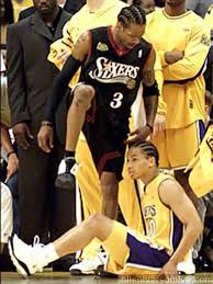 Iverson steps over Laker