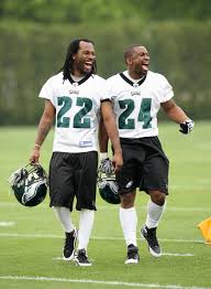 Brown and Samuel walking during practice