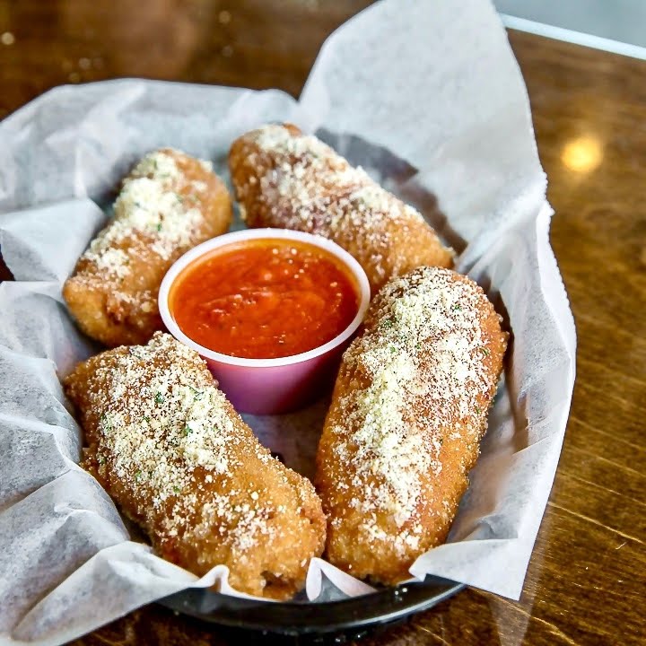 Fam's Brewing Co. featuring Famulari's Pizzeria by null
