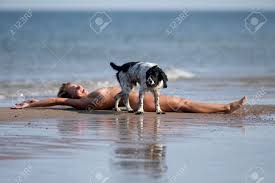 summer nudist |Female Figure And Dog, Summer Scene On Nudist Beach Stock Photo, Picture  and Royalty Free Image. Image 201189318.