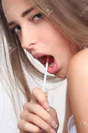 teen girl sucking|Teenage girl licking a lollipop Stock Photo - Alamy