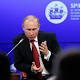 Russia: Vladimir Putin plays down threat of 'new Cold War'