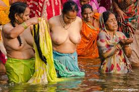 Indian woman washing herself half naked in the river jpg x Naked indian woman