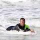 Pete Evans gets tossed in the surf as he rides the swell at Maroubra beach 