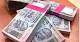 Rupee ends close to 56 level; down 39 paise on heavy dollar demand