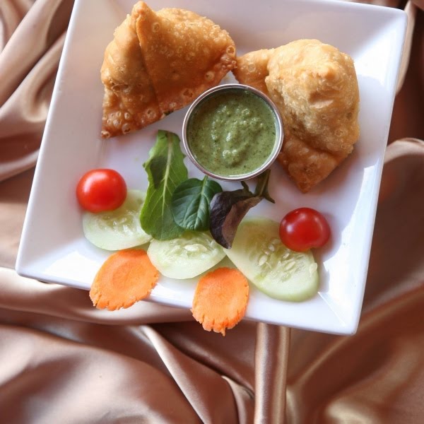 Mela Modern Indian Cuisine by null