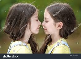 two little girls kissing|Big Kiss Sister Two Little Girls Stock Photo 1290245485 | Shutterstock