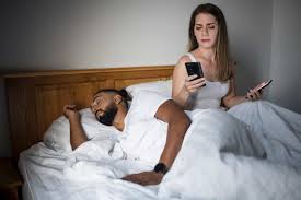 Cheating husband couple issue infidelity betrayal disloyal man using mobile phone watching porn film sex chat lying bed jpg x While sleeping