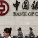 China to ease curbs on foreign investment in banks 