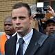 Oscar Pistorius clashed with police officer who took his gun, court told