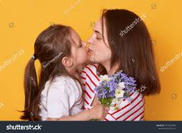 moter daughter oiss|Mother daughter kissing other hi-res stock photography and images - Alamy