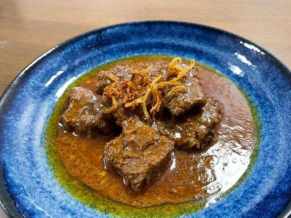 贵州苗家粉面 ( Xi Jiang Qian Hu) Beef Noodle Soup by null