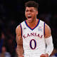 Jayhawks' Mason makes play of night as Kansas, Kentucky win at Champions Classic 