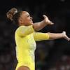 Simone Biles, Rebeca Andrade share powerful sideline moment ...