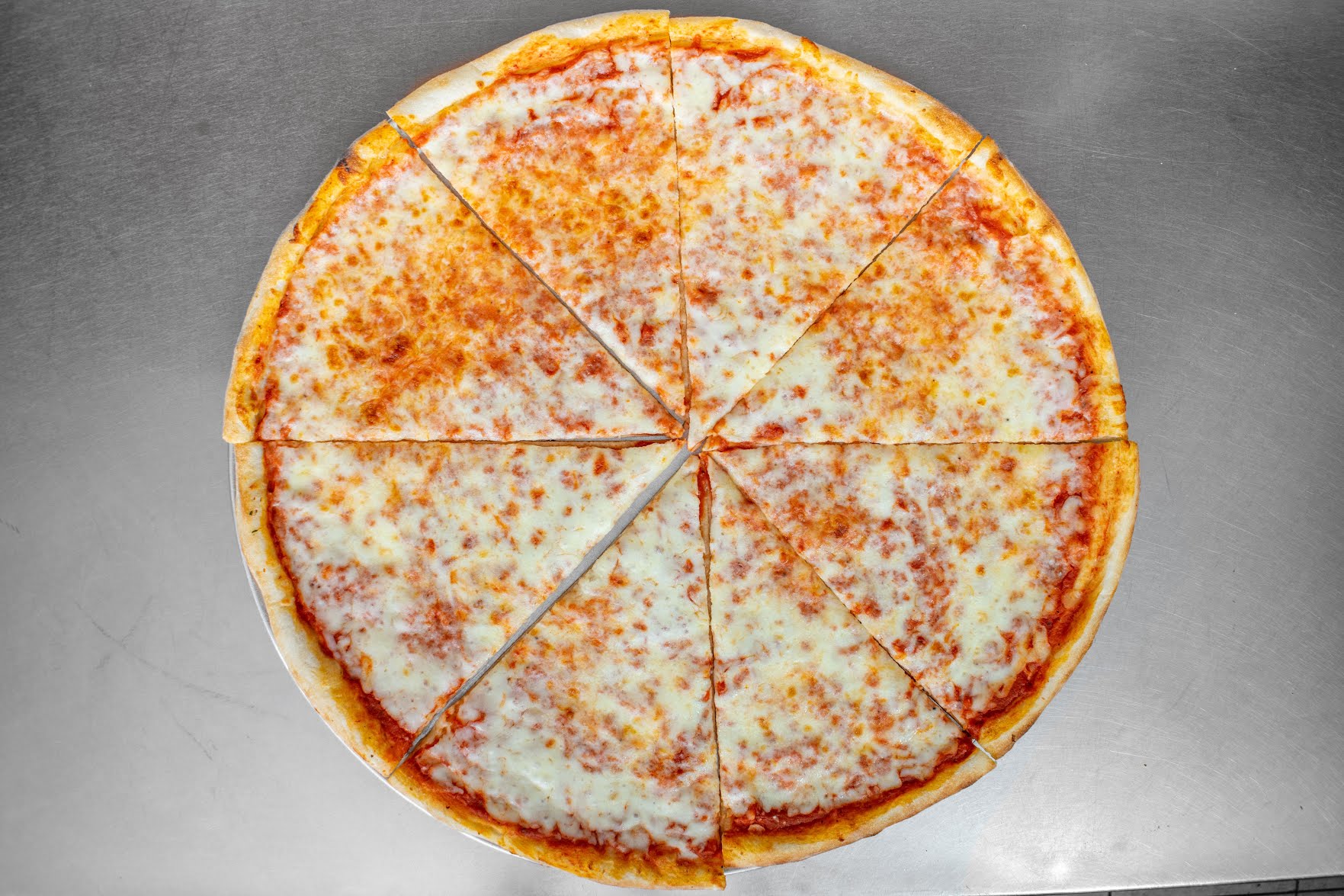 Tom's Delicious Pizza by null
