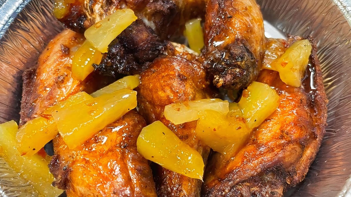 11Hauz Authentic Jamaican Food by null